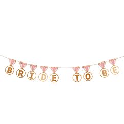 Ruusukultainen polttaribanneri tekstillä "BRIDE to be".
