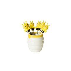 Keraaminen hunajapurkki ja mehiläis cocktailtikut