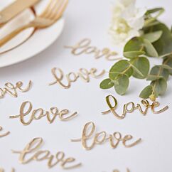 Kultaiset "love" konfetit häihin.