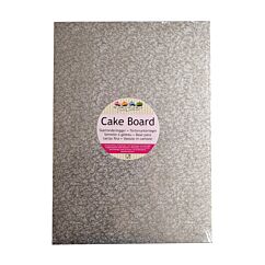 Suorakulmainen hopeinen kimalteleva kakkualusta.