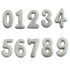 Hopea numerokakkukynttilä glitterillä.