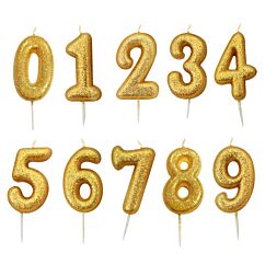 Kultainen numerokakkukynttilä glitterillä.
