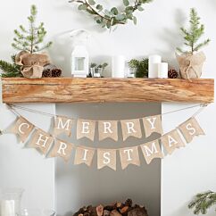 Juuttikangasta tehty joulukoriste "Merry Christmas". 