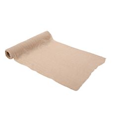 Vaalea luonnonruskea / hasselpähkinä- värinen musliinikangas.