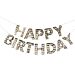 "Happy Birthday" -banneri kultaisilla hapsuilla.