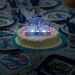 Vilkkuva kakkukoriste tekstillä "Happy Birthday"